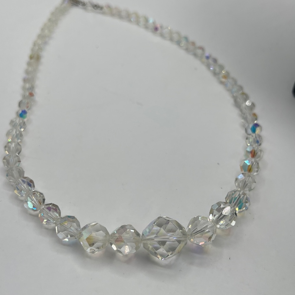 Vintage aurora borealis graduated beads.
